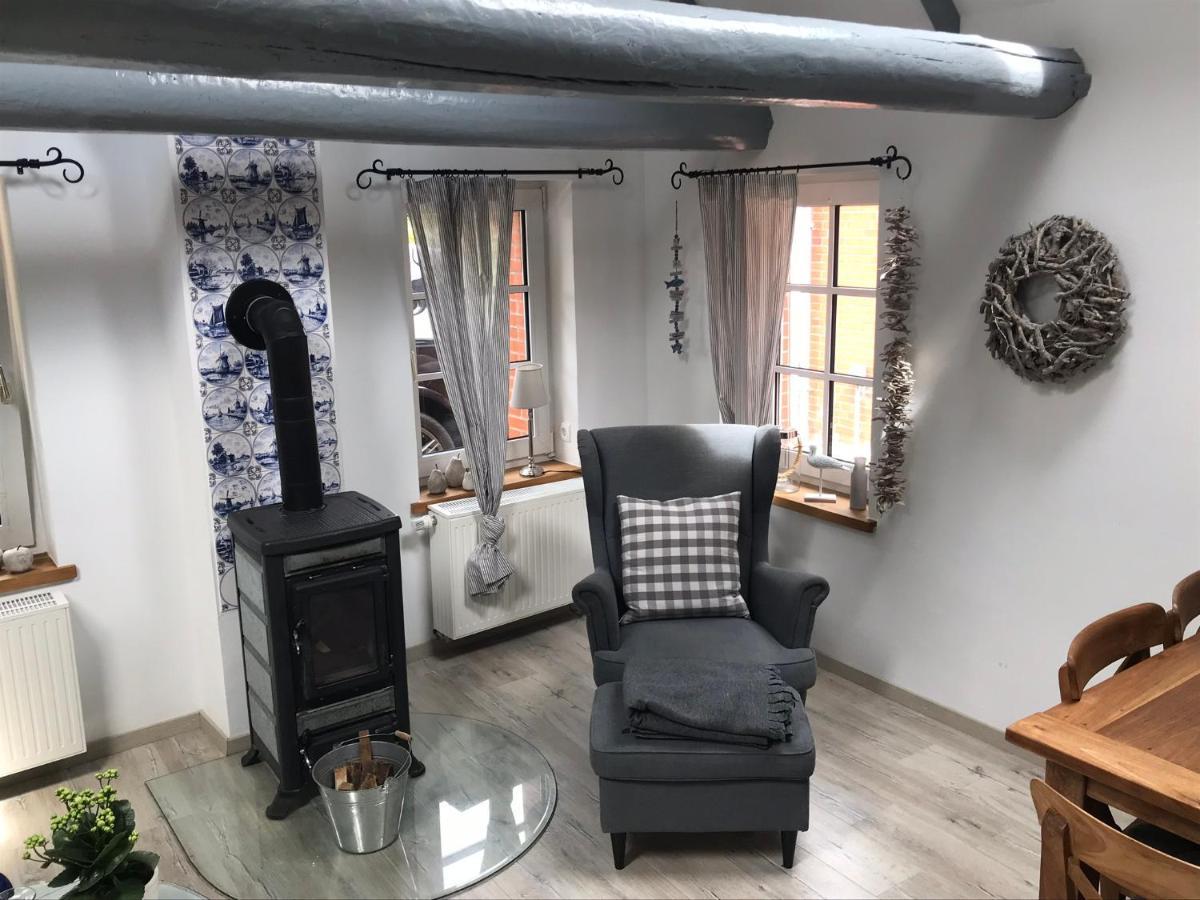 Ferienhaus Wattwurm Rysum Esterno foto