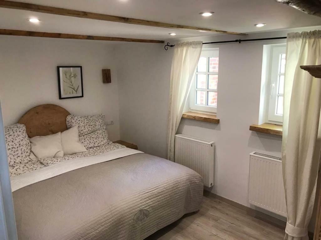 Ferienhaus Wattwurm Rysum Esterno foto