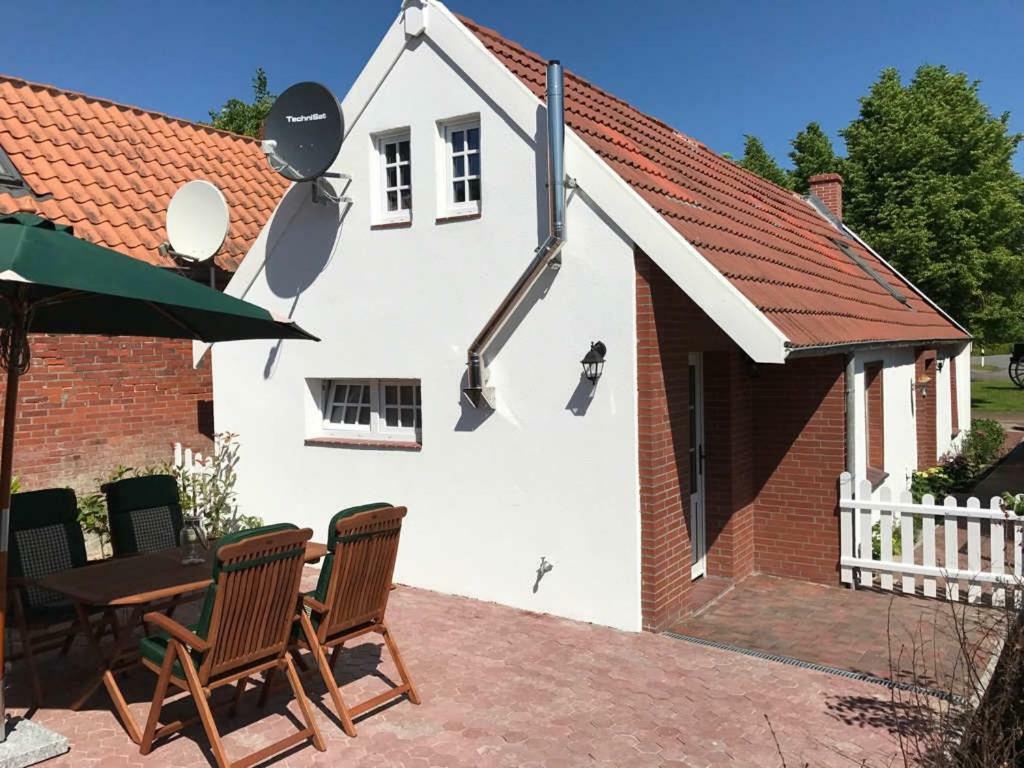 Ferienhaus Wattwurm Rysum Esterno foto